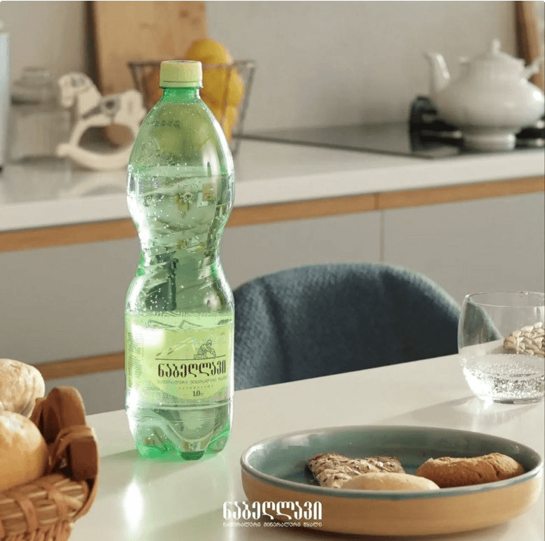 1L PET bottle in kitchen/home setting